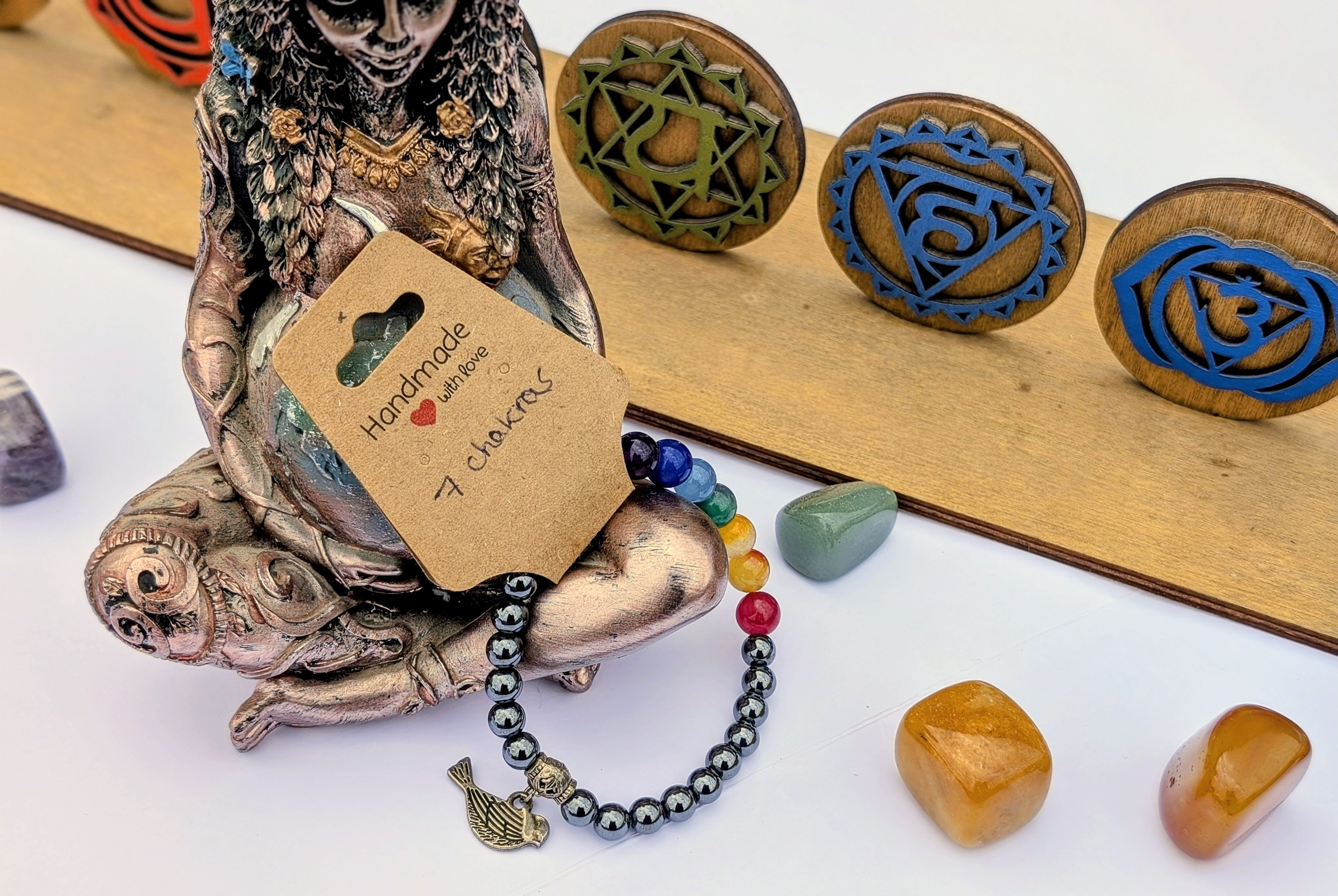 Bracelet 7 chakras, hématites, pendentif oiseau